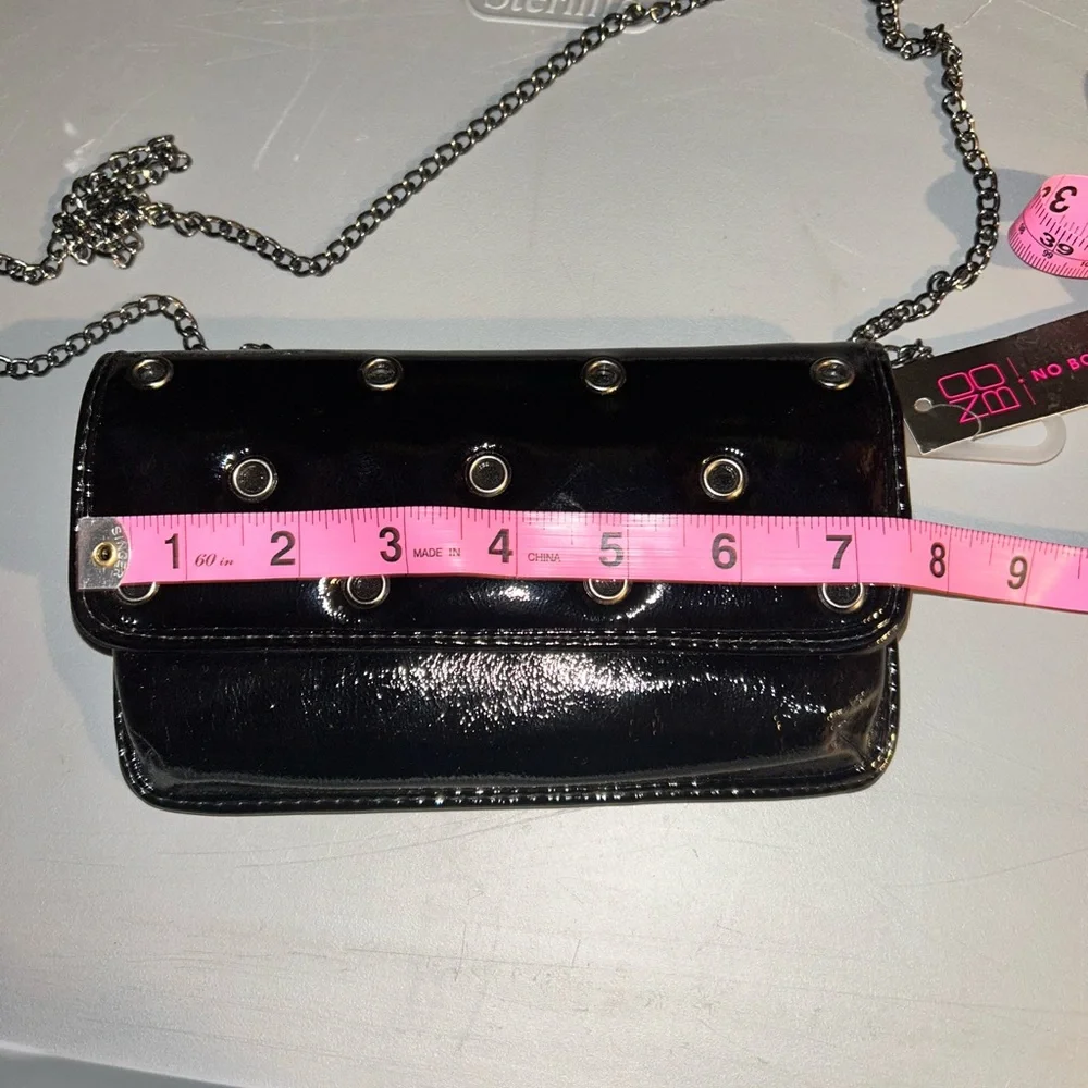 No Boundaries Shiny Black Crossbody Bag with Eyelets